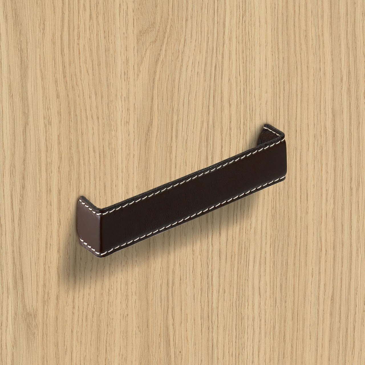 HETTICH Griff Dublina, •–• 160, L 168 mm, B 34 mm, H 30 mm, Leder dunkelbraun, 9113509 HETTICH Griff Dublina, •–• 160, L 168 mm, B 34 mm, H 30 mm, Leder dunkelbraun, 9113509
